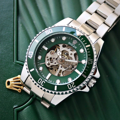 Rolex luxury silver wrist and green heart watch